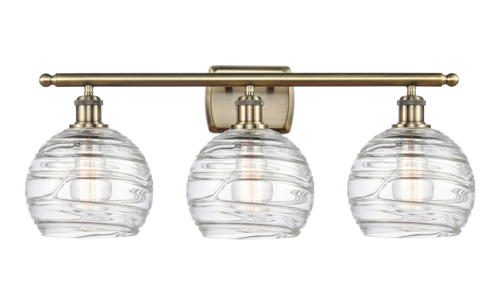 Athens Deco Swirl - 3 Light - 28 inch - Antique Brass - Bath Vanity Light